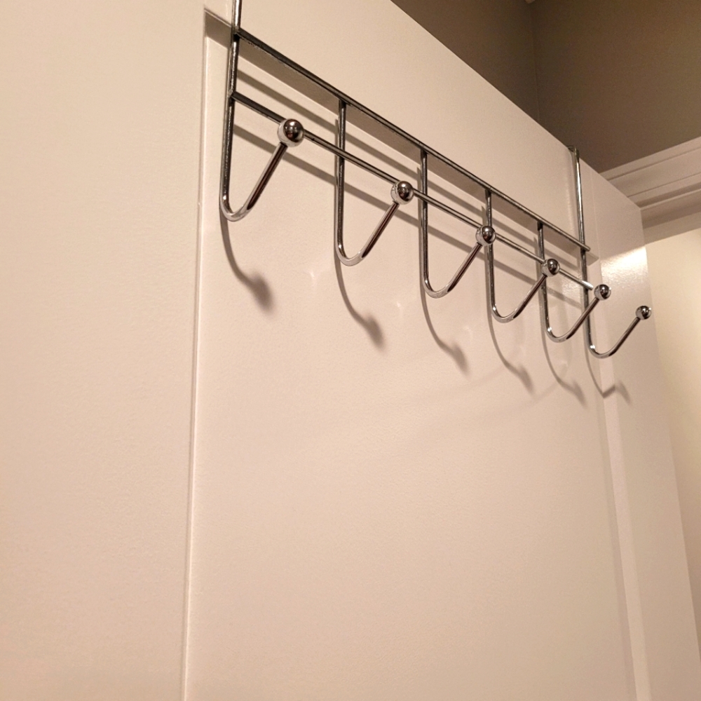 Over-the-door towel rack